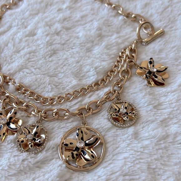 Gold Tone Flower Charm Guess Necklace - Picture 3 of 5